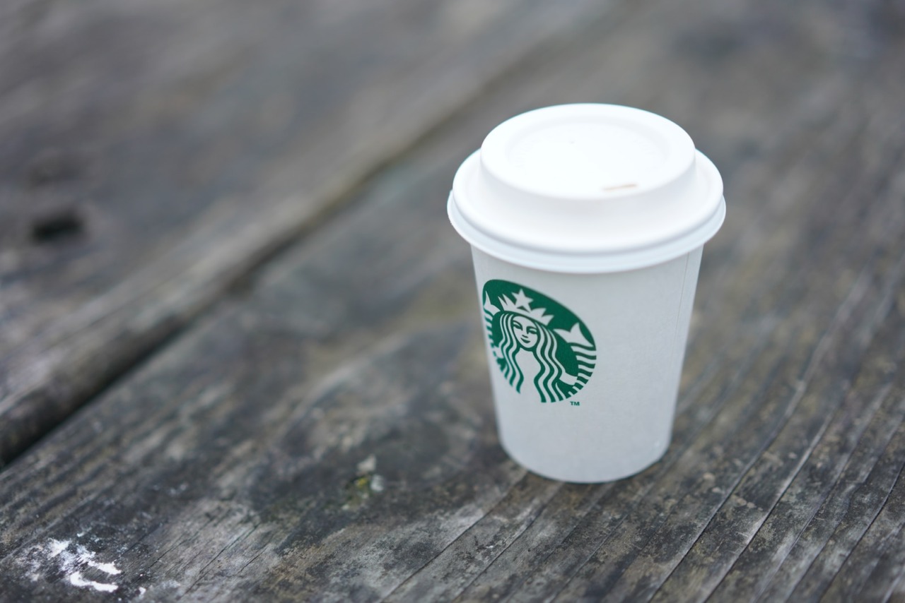 white Starbucks disposable cup