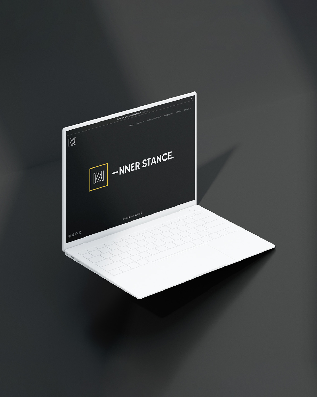 Een strakke witte laptop met een donker scherm met de tekst "INNER STANCE" in een minimalistisch, modern design.