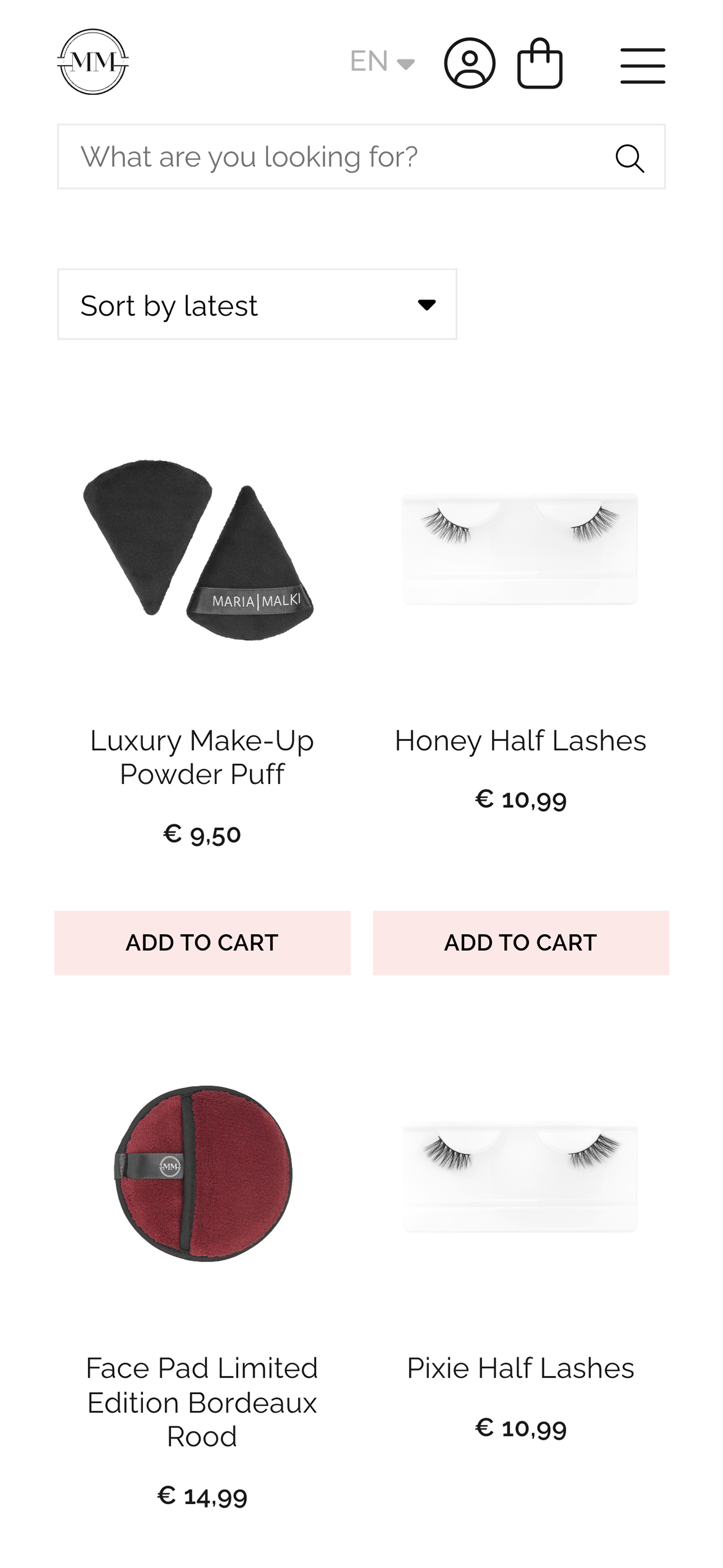 Schermafbeelding van een online winkel met make-uptools van Maria Malki Cosmetics, waaronder poederdonsjes, een gezichtskussentje en sets valse wimpers.