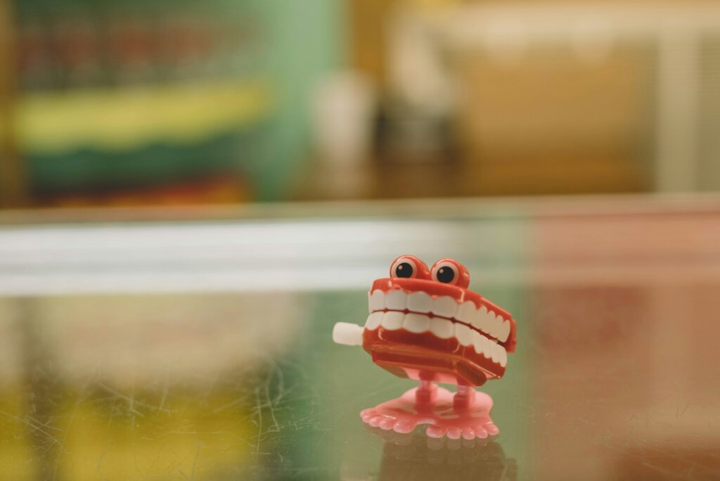 a red toy on a table
